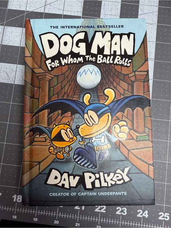 Other - Dog Man: For Whom the Ball Rolls, is Book 7 graphic novel series by Dav Pilkey